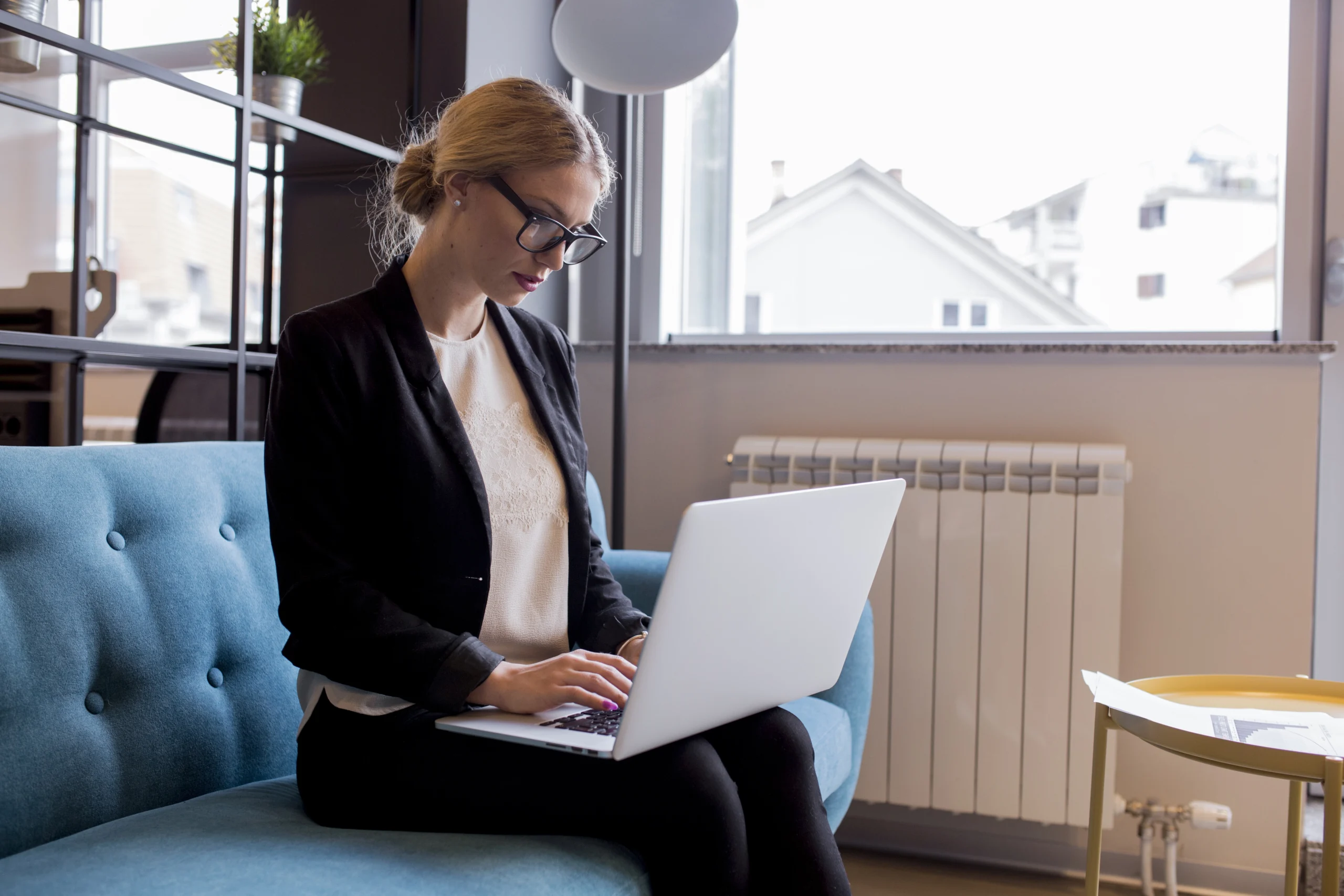 modern young businesswoman using laptop office scaled Atcon System